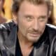 Johnny Hallyday dos au mur